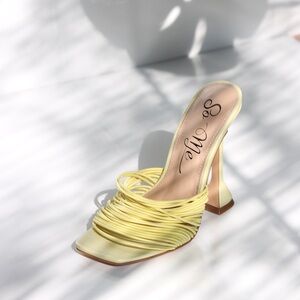 Yellow women’s kitten heel mules